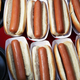 Rows of hot dogs in buns